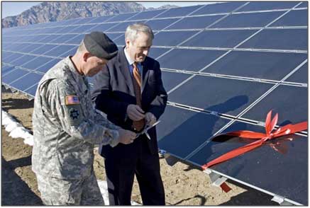 Then-Colorado Gov. Bill Ritter Jr. and Maj. Gen. Mark A. Graham prepare to cut the ribbon on the Fort Carson solar array in 2008. Image courtesy Michael J. Pach / U.S. Army. 