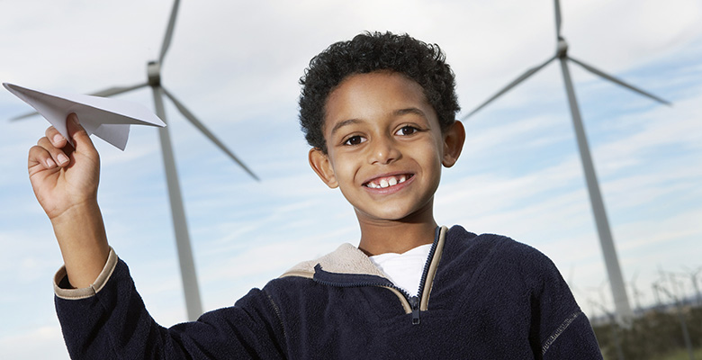 Boy_and_Paper_Airplane_and_Wind_Turbines_780x400.jpg
